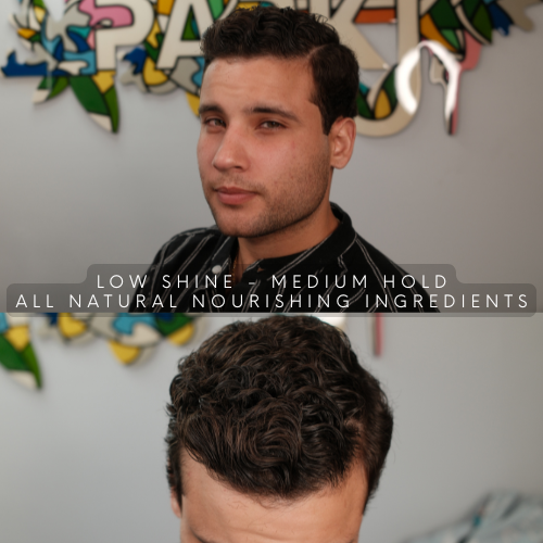 A Hispanic man with curly hair is using hair clay to style and define his natural curls, demonstrating the excellent hold and natural matte finish on hair that this specific men's hair clay provides. This high-quality clay hair product is ideal for achieving a sophisticated yet natural matte hairstyle, proving itself as a good hair clay for enhancing texture. For guys seeking the best hair clay for guys with curly hair, this texture grooming clay offers superior control and a non-greasy feel.